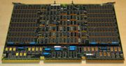 A four-megabyte RAM card measuring about 56 by 38 centimeters (twenty-two by fifteen inches); made for the VAX 8600 minicomputer (ca. 1986). Dual in-line package (DIP) Integrated circuits populate nearly the whole board; the RAM chips are the most common kind, and located in the rectangular areas to the left and right.