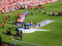 Arsenal captain Patrick Vieira lifts the 2003&ndash;04 Premier League trophy.