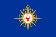 The Anglican Communion uses the compass rose as its symbol, signifying its worldwide reach and decentralized nature. It is surmounted, like ecclesiastical coats of arms, by a bishop's mitre; in the centre is a cross of St. George recalling the communion's origins in the Church of England. The Greek motto, Ἡ ἀλήθεια ἐλευθερώσει ὑμᾶς ("The truth will set you free") is a quotation from John 8:32. It was designed by Edward Nason West, Canon of the Cathedral of St. John the Divine in New York City.