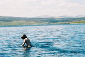 Cow Green Reservoir, with (l to r) Great Dun Fell, Little Dun Fell and Cross Fell in the background at a distance of about 10 km