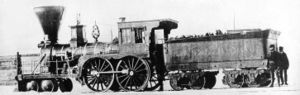 Atlantic and St. Lawrence Railroad locomotive Coos circa 1856 in Longueuil, Quebec. The short wheelbases of the leading wheels, drivers and the tender bogies were soon expanded on locomotives of this type.