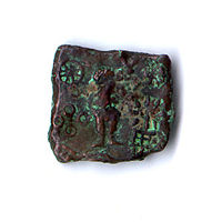 Coin showing Karttikeya and Lakshmi (Ujjain, circa 150&ndash;75 BC)