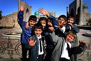 Boys pose for a picture at Registan. Over a third of Uzbekistan's population is under 14 years old.