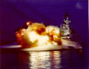 USS New Jersey fires a broadside of 16-inch (406 mm) guns