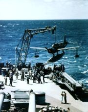 USS Missouri recovers an Vought OS2U Kingfisher during her 1944 shakedown cruise. Note the catapult below the plane, which was used to launch the planes off the battleship.