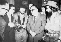 (right to left) Rebel leader Camilo Cienfuegos, Cuban President Manuel Urrutia, and Guevara. January 1959.