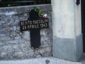 Cross marking the place in Mezzegra where Mussolini was shot