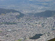 Northern Quito as seen from the Telefériqo (Aerial tramway) Station at Cruz Loma (part of the Pichincha mountain complex at about 13,123 ft; 4,000 m, ). Lots of buildings (10 or more stories) have been constructed around the financial center of the city throughout the last 35 years.