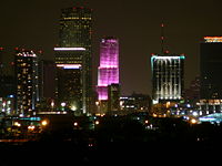 The Bank of America Tower lit hot neon pink, one of the colors that has become the epitome of Miami's fashion industry