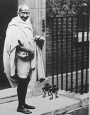 Gandhi in front of Number 10 after meeting with Ramsey MacDonald in 1931 to discuss India's independence. With the advent of photography, pictures like this became common place; it became obligatory that Prime Ministers, heads of state, celebrities and ordinary people pose in front of Number 10's famous door.